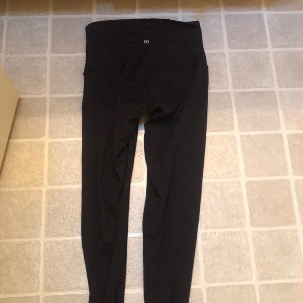 Size 4 black wunder unders lululemon